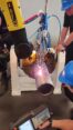 Fanuc M-20iD25 robotic arm with orbital arc-welding torch welding a stainless-steel tube in a clamping fixture